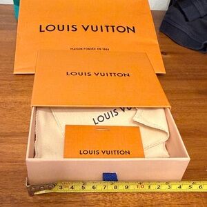 Brand new Louis Vuitton authentic Vibrant Orange Box, shopping bag and dust bag